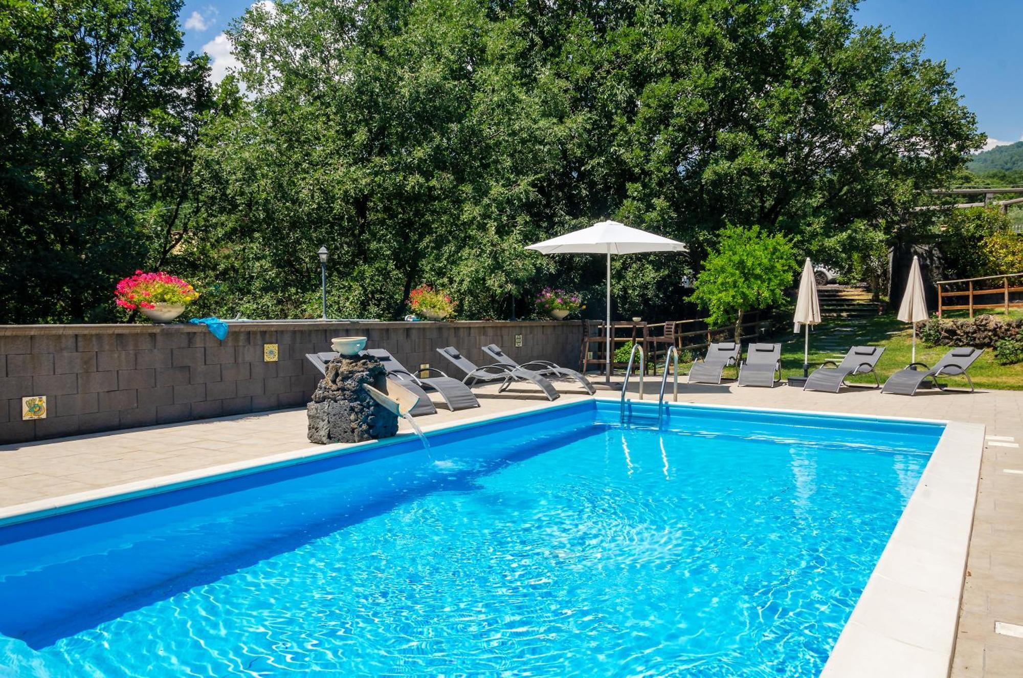 מסקלי Villa Del Gelso Chalet Nel Parco Delletna מראה חיצוני תמונה